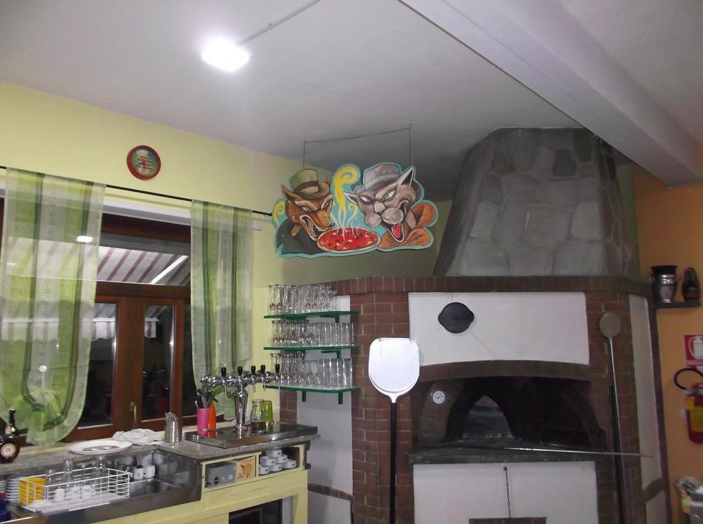 Il Gatto E La Volpe Hotel Avigliana Bagian luar foto